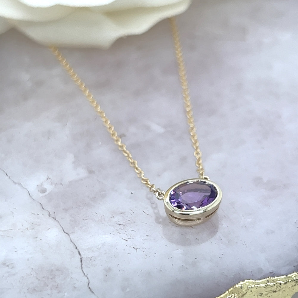 9ct Yellow Gold Oval Amethyst Solitaire Necklace.