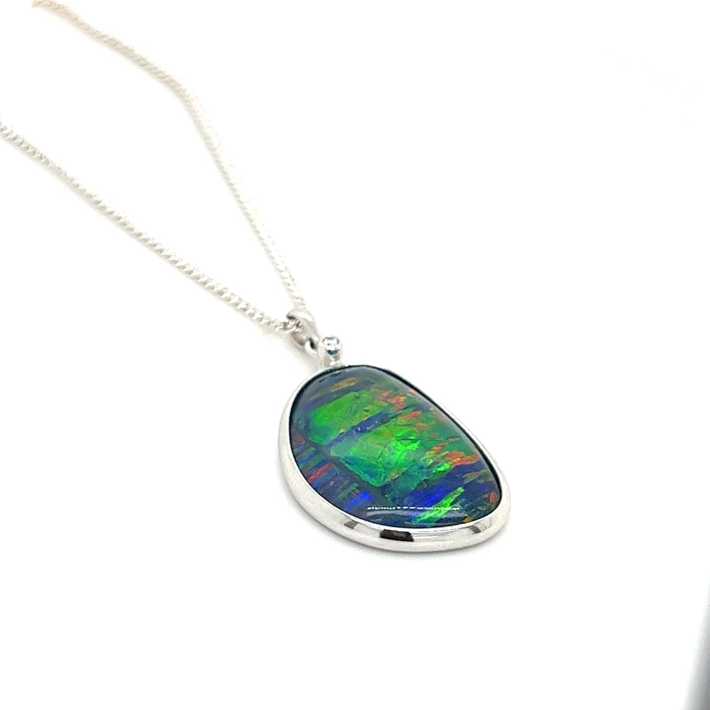 Freeform Opal Triplet Pendant with Blue Green Red Hues in 9ct White Gold