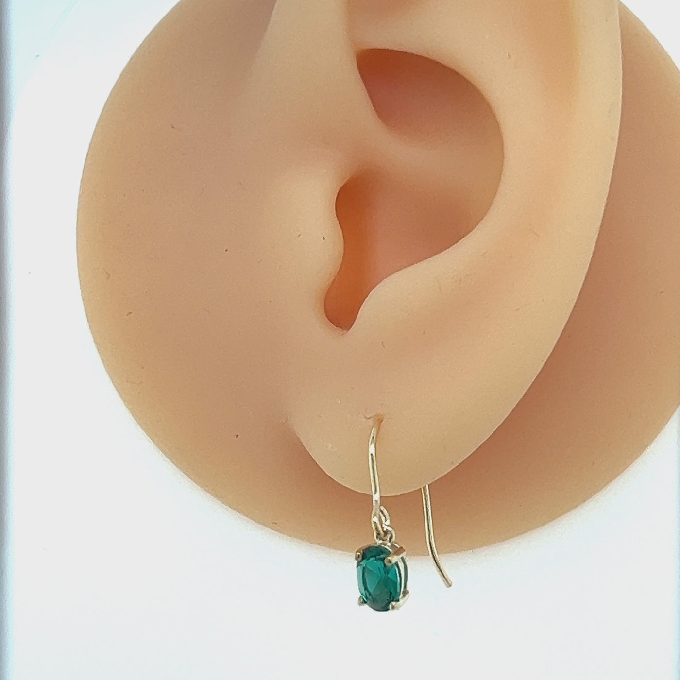 Emerald Oval Drop Earrnigs with 9ct Yellow gold fittings.