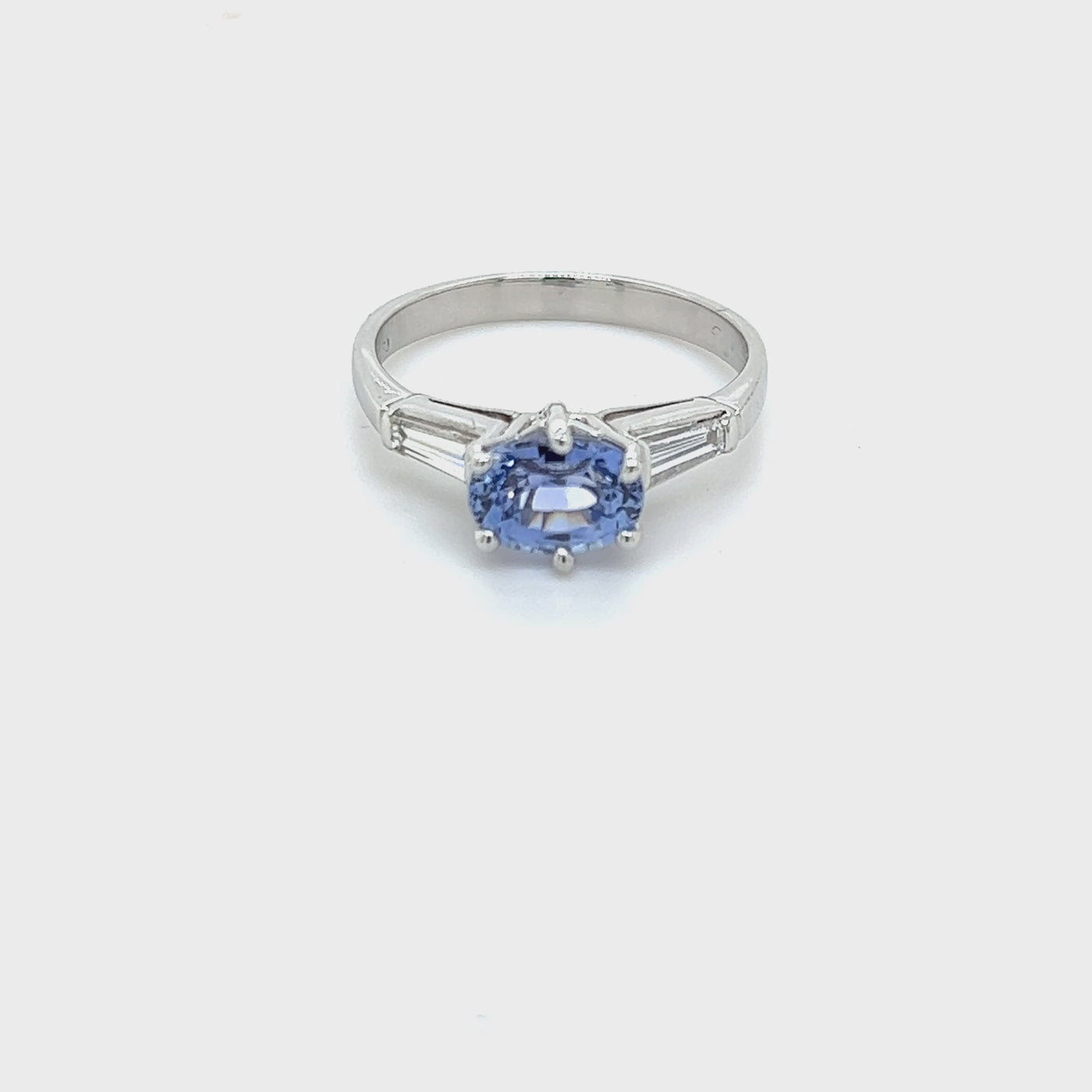 Oval Ceylon Sapphire & Baguette Diamond Ring.