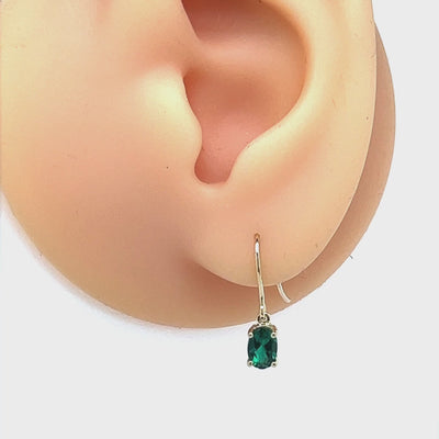 Emerald Oval Drop Earrnigs with 9ct Yellow gold fittings.