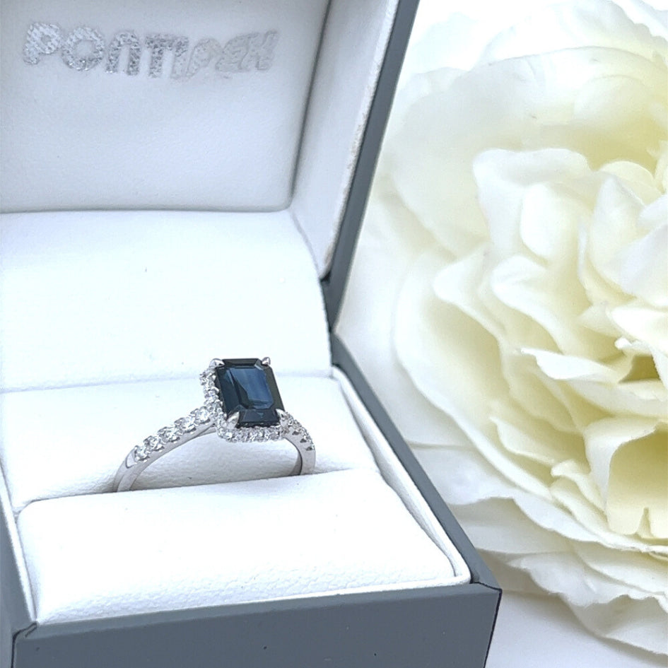 18ct White Gold Blue Sapphire & Diamond Halo Ring