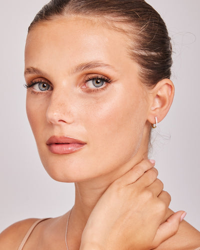 9ct Yellow Gold Oval Diamond Huggie Earrings.