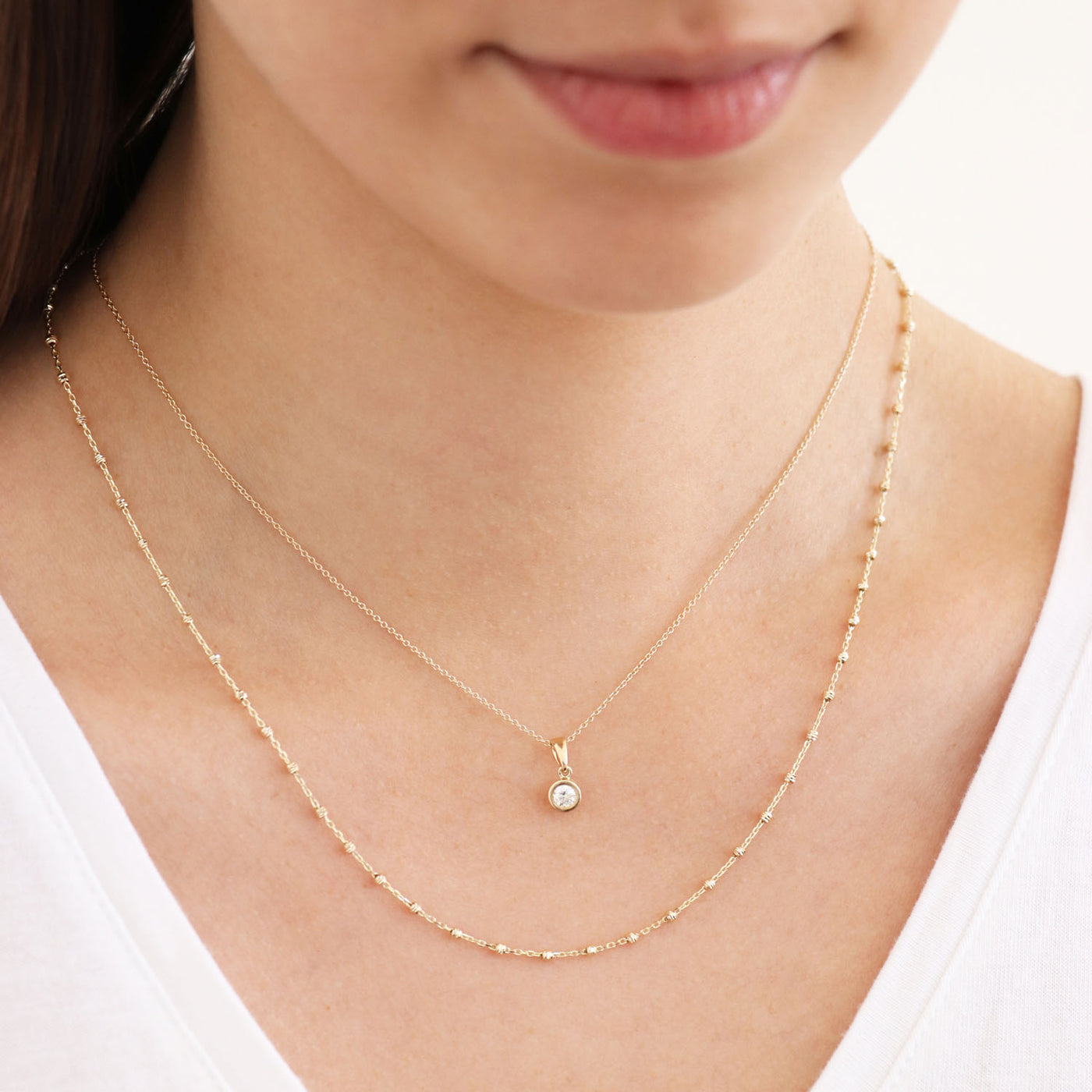 9ct yellow Gold Scattered Bead Necklace.
