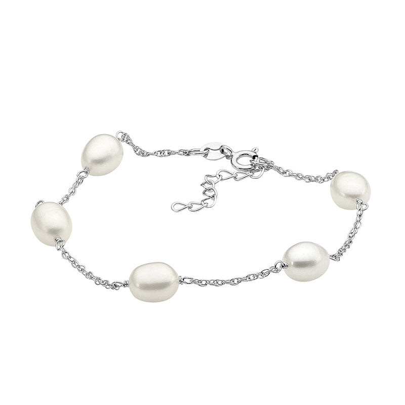 White Freshwater Pearl Bracelet scattered on fine silver bracelet.