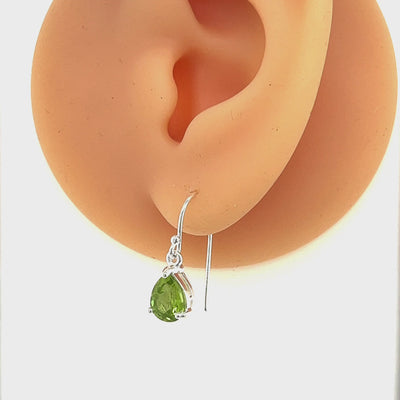 Silver Pear Shaped Peridot Drop Earrings.