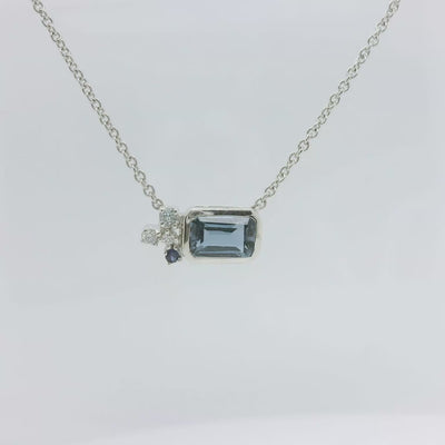 9ct White Gold Blue Topaz & Diamond Cluster Necklace.