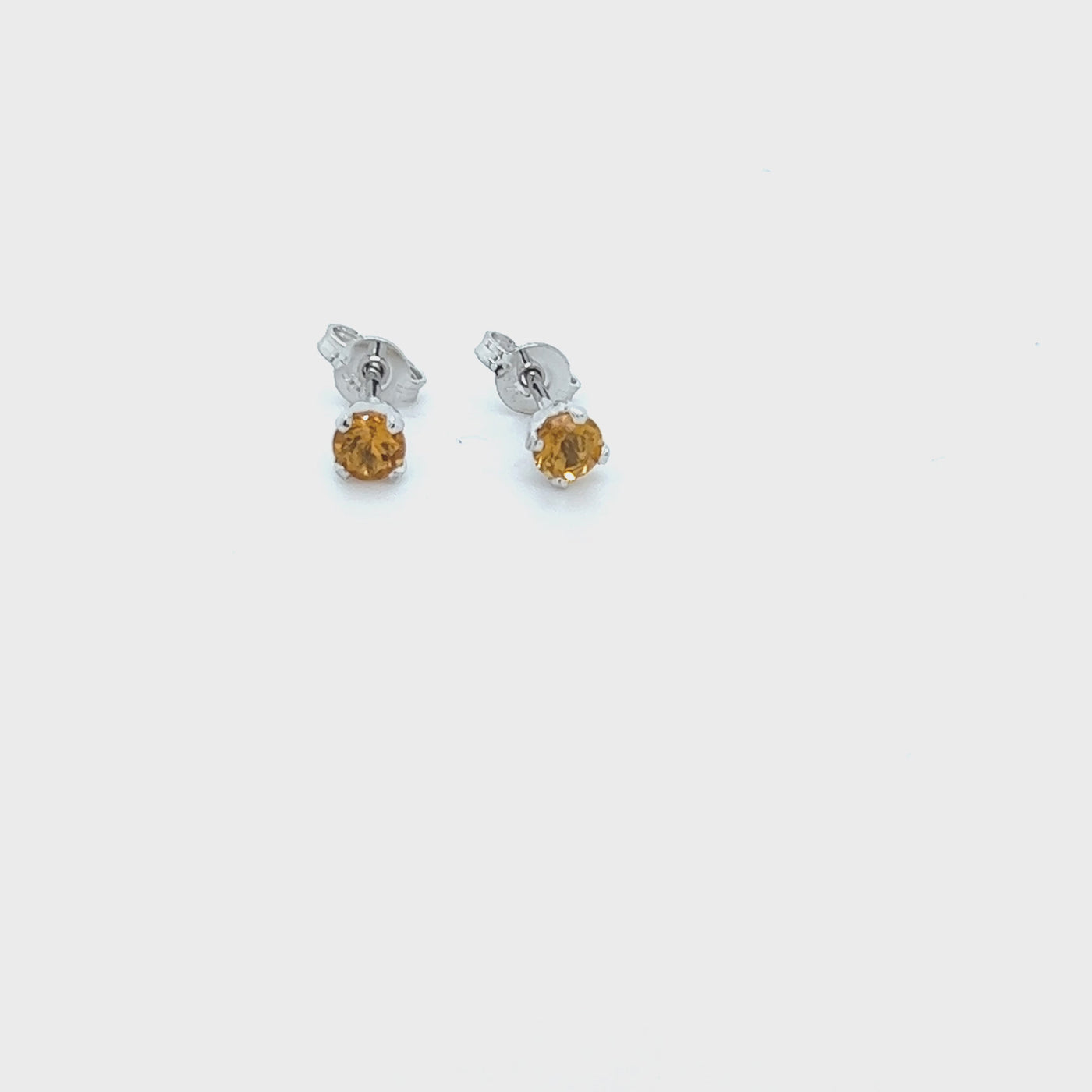 9ct White Gold Citrine Solitaire Stud Earrings.