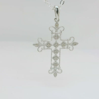 9ct White Gold Fancy Diamond Set Cross.