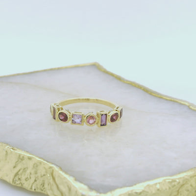 Yellow Gold Multi Natural Pink coloured gemstone dress ring.