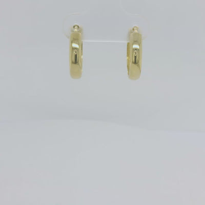 9ct yellow Gold domed huggie earrings.