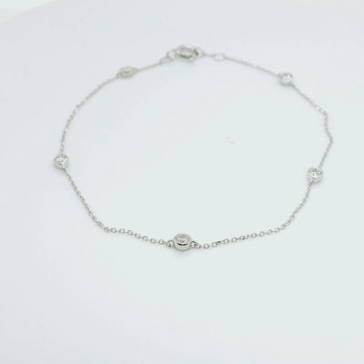 9ct White Gold Scattered Bezel Set Diamond Bracelet- 0.25 carats.