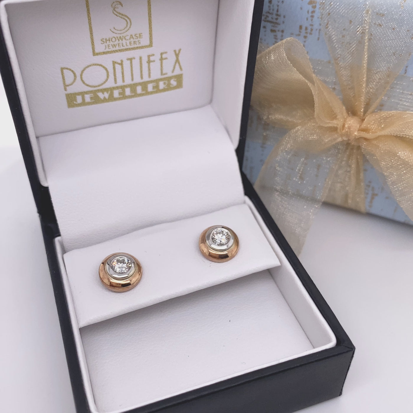 9ct Gold Diamond Solitaire Studs - 0.40 carats.