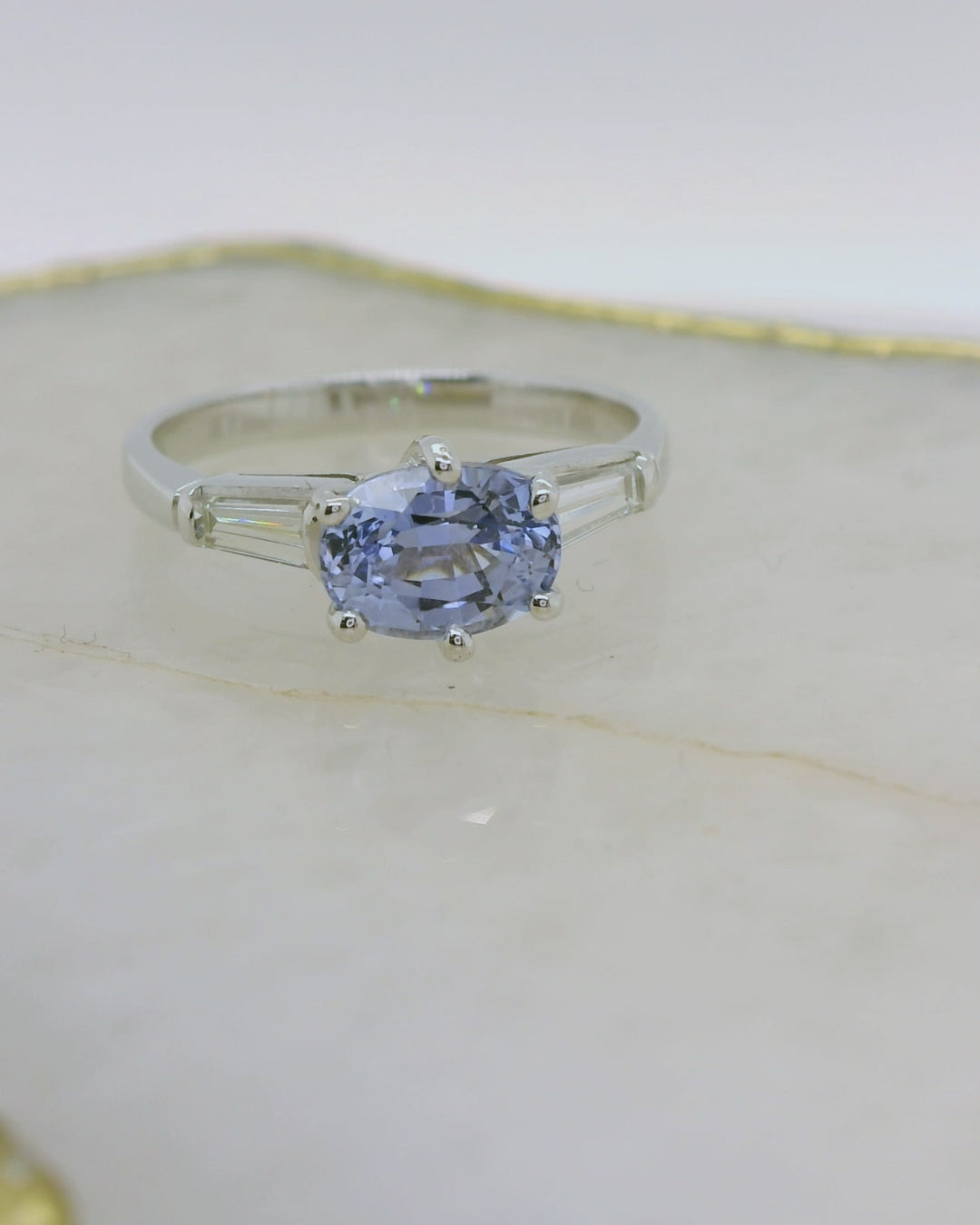 Oval Ceylon Sapphire & Baguette Diamond Ring.