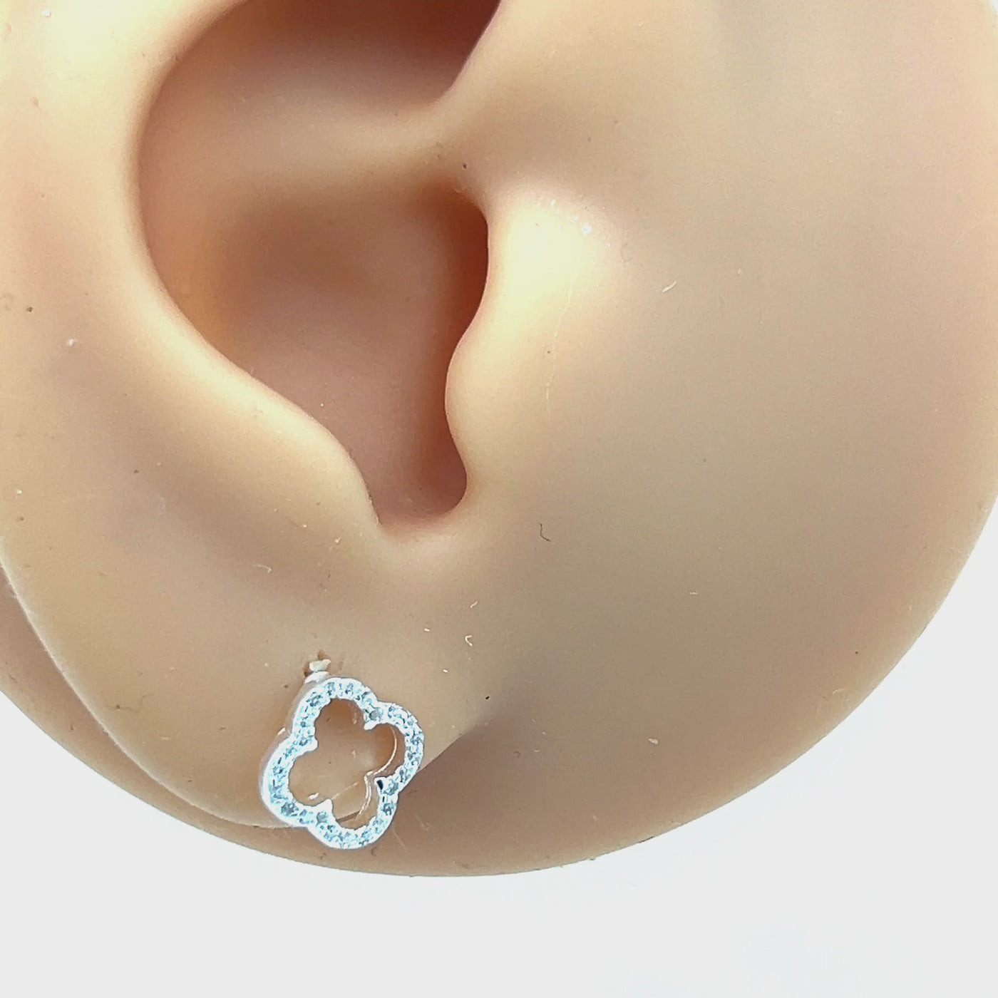 Silver Open Clover Stud Earrings set wtih Cubic Zirconias.