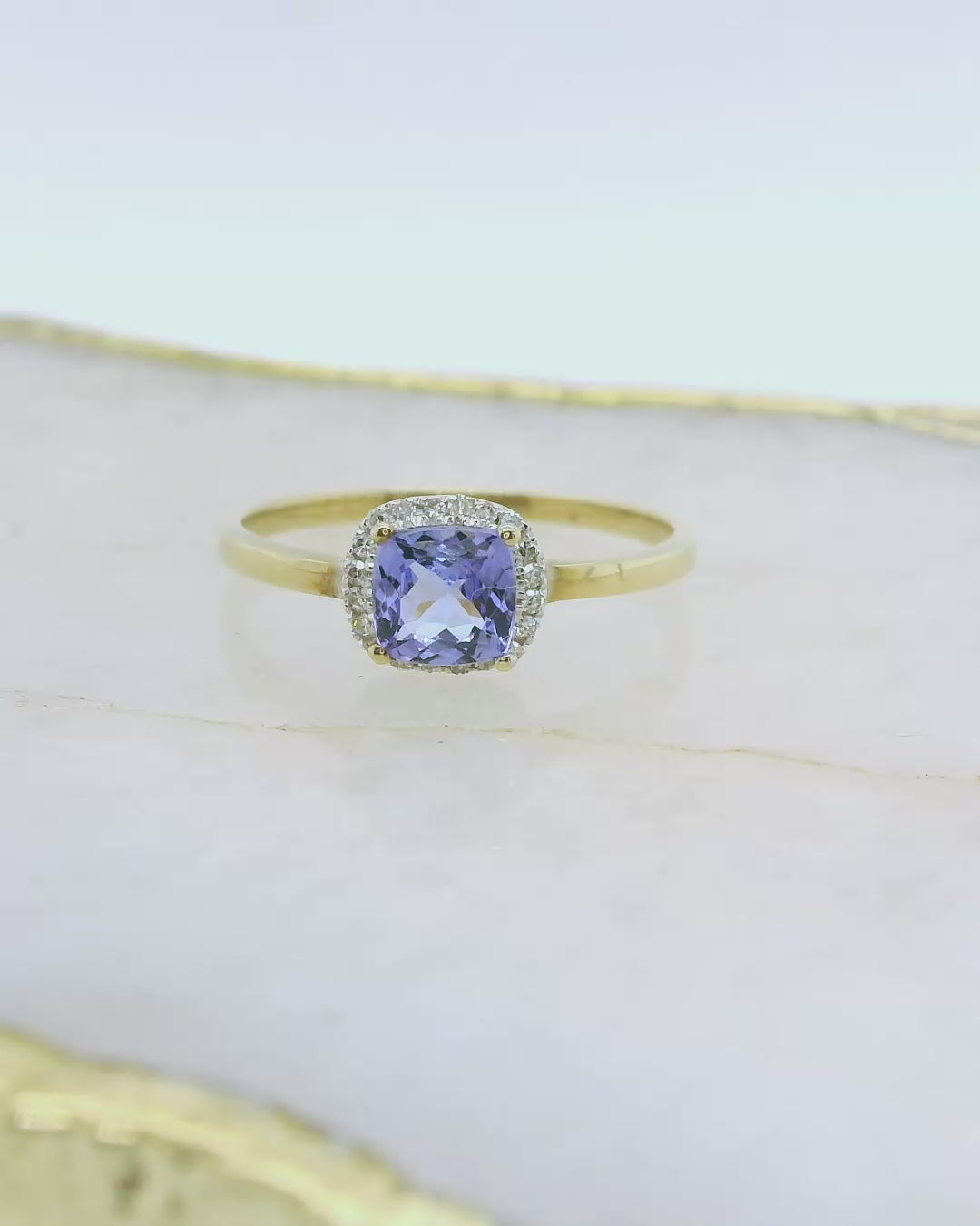 9ct Gold Tanzanite & Diamond Halo Dress Ring.