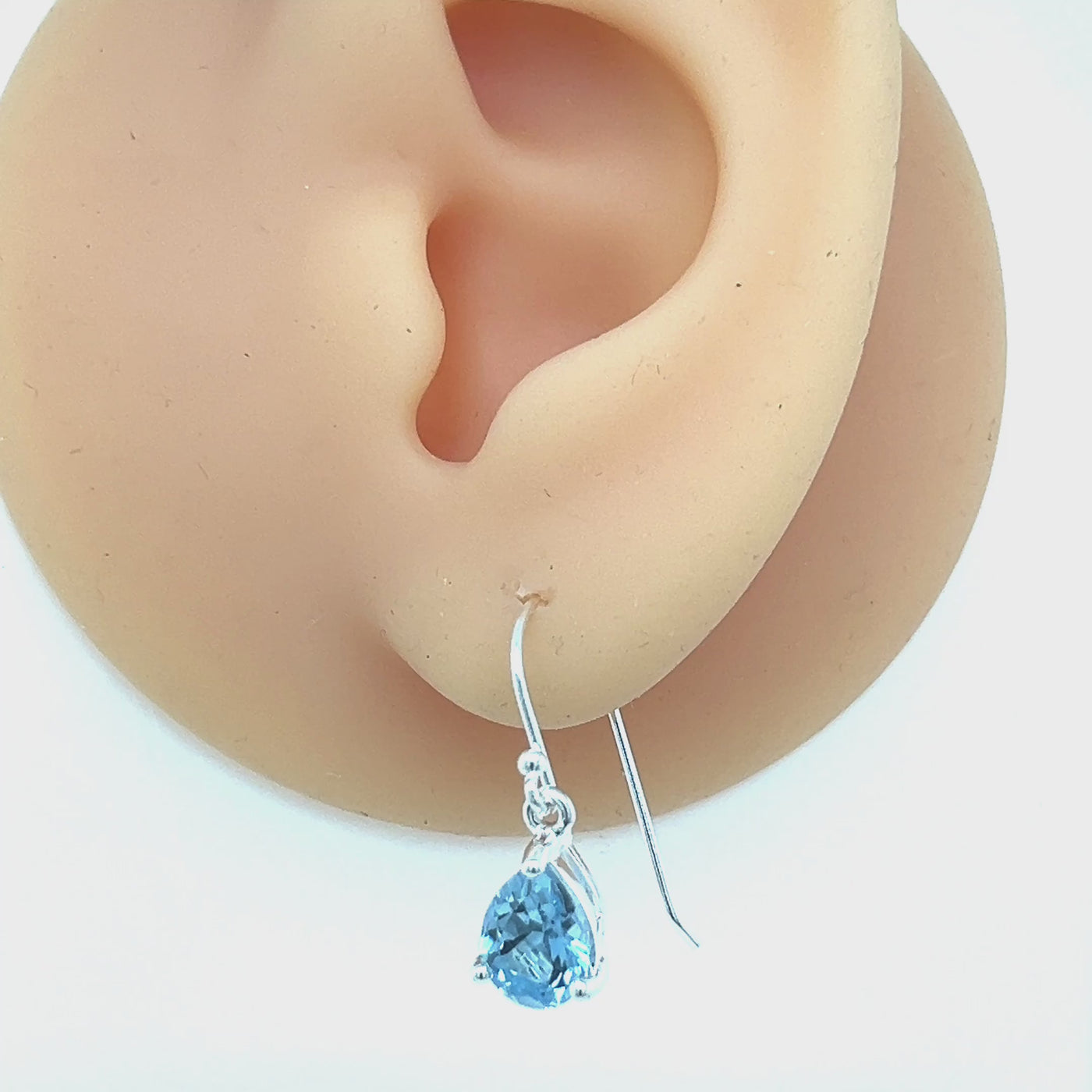 Sterling Silver Teardrop Blue Topaz Drop Earrings.