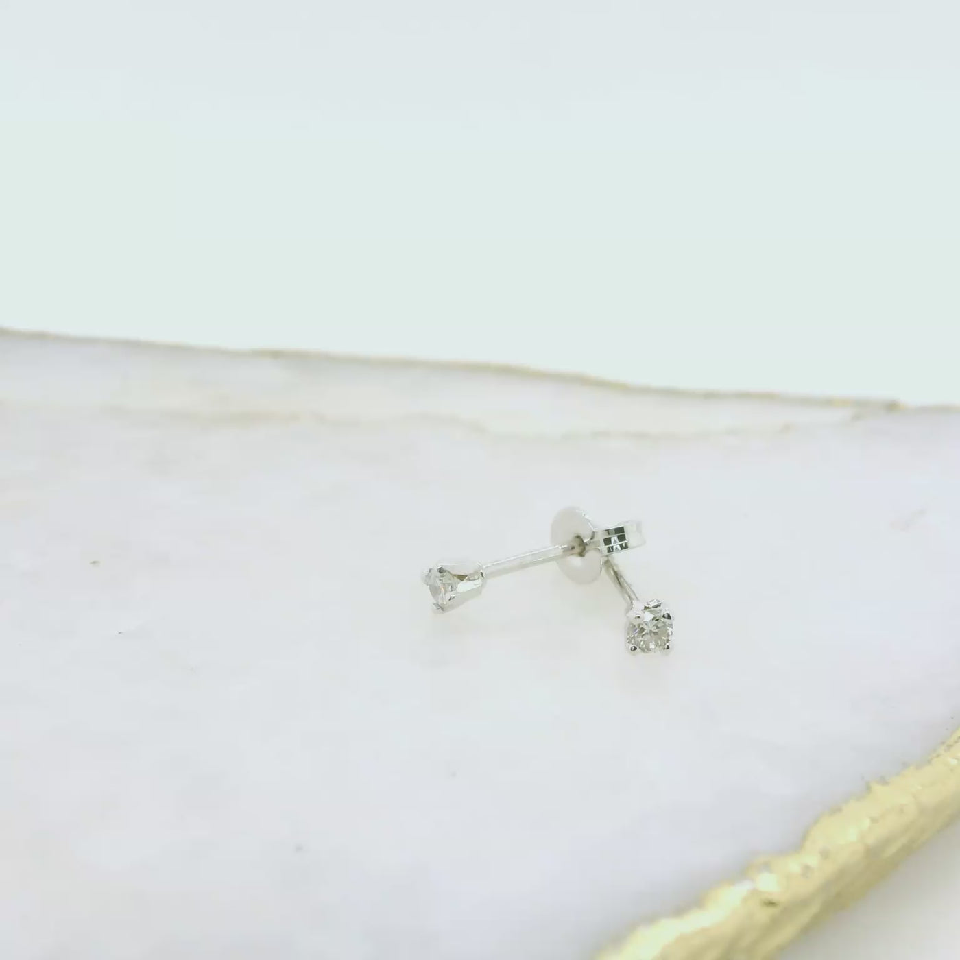 9ct White Gold Diamond Stud Earrings. - 0.13ct