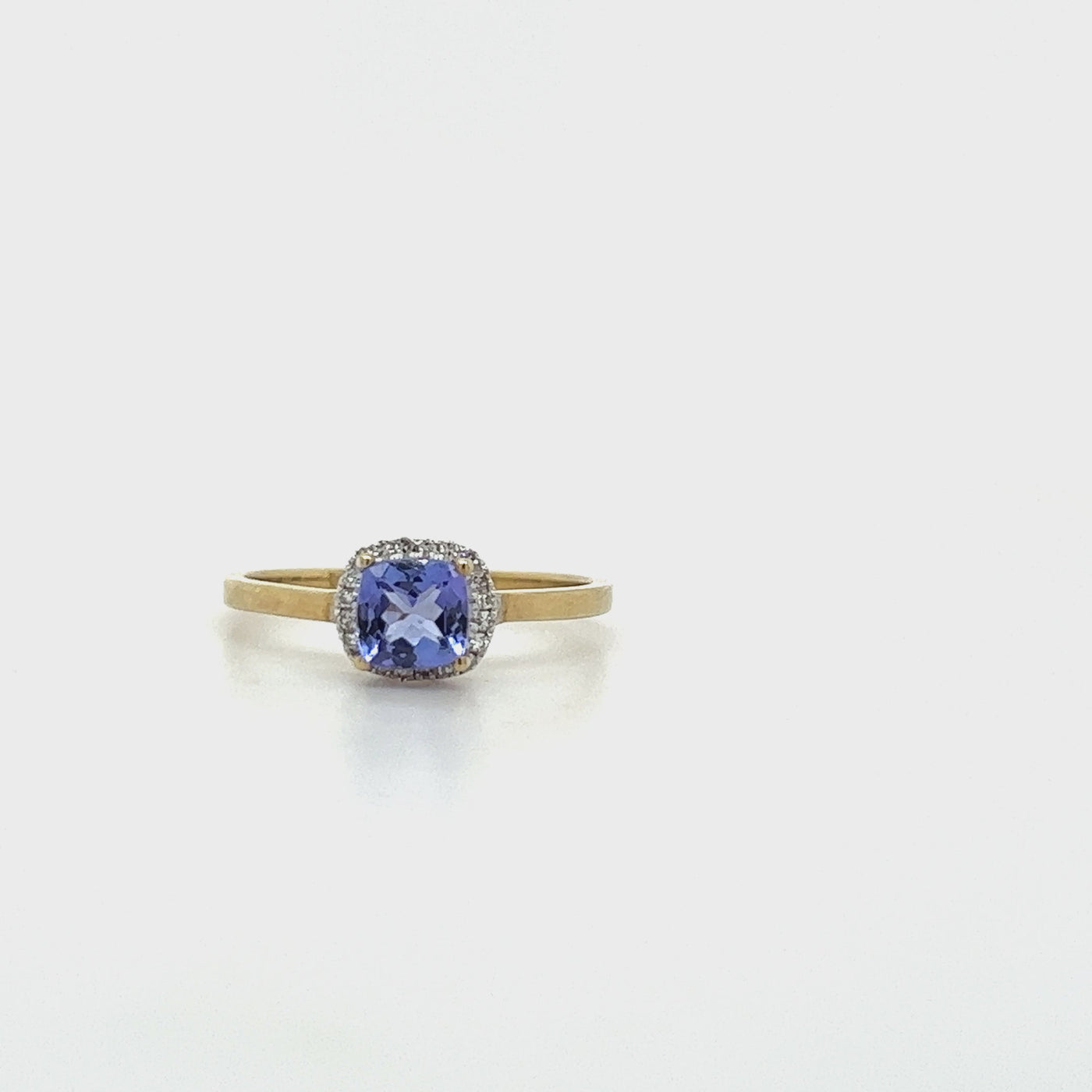 9ct Gold Tanzanite & Diamond Halo Dress Ring.