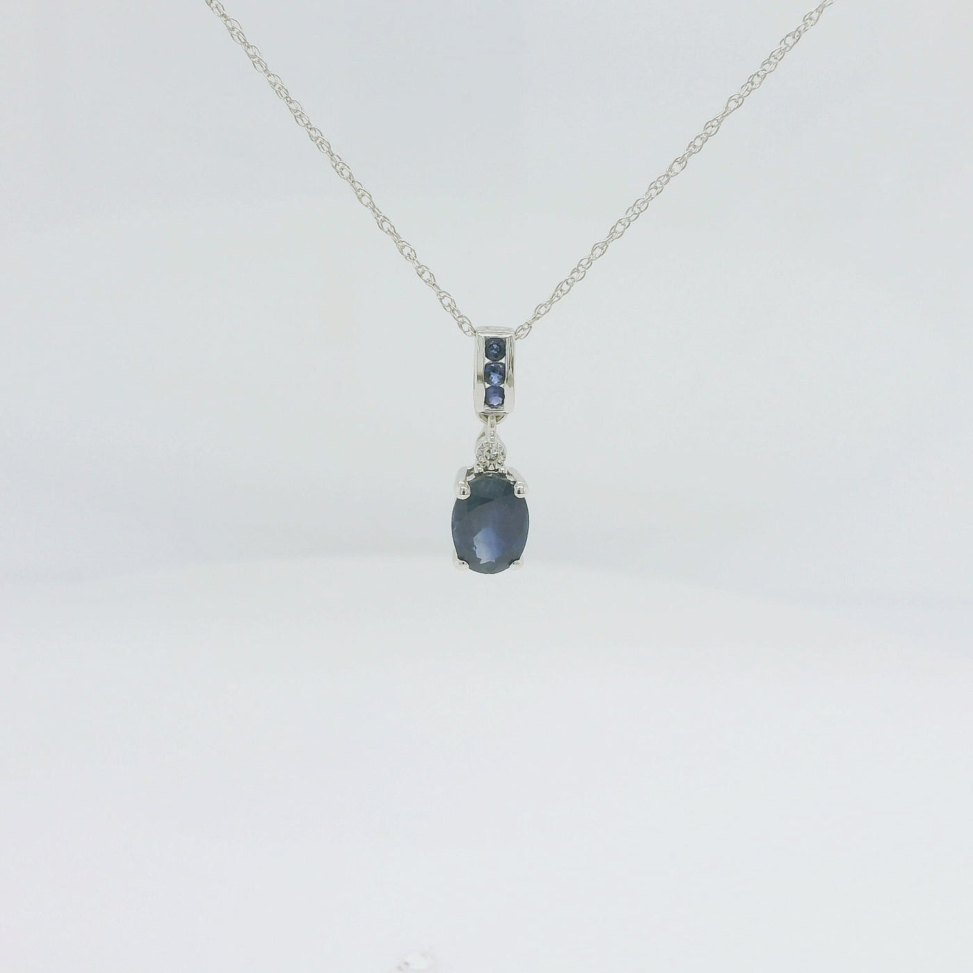 9ct White Gold Oval Blue Sapphire Pendant